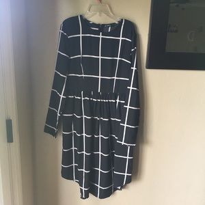 Long sleeve, black and white SHEIN dress.